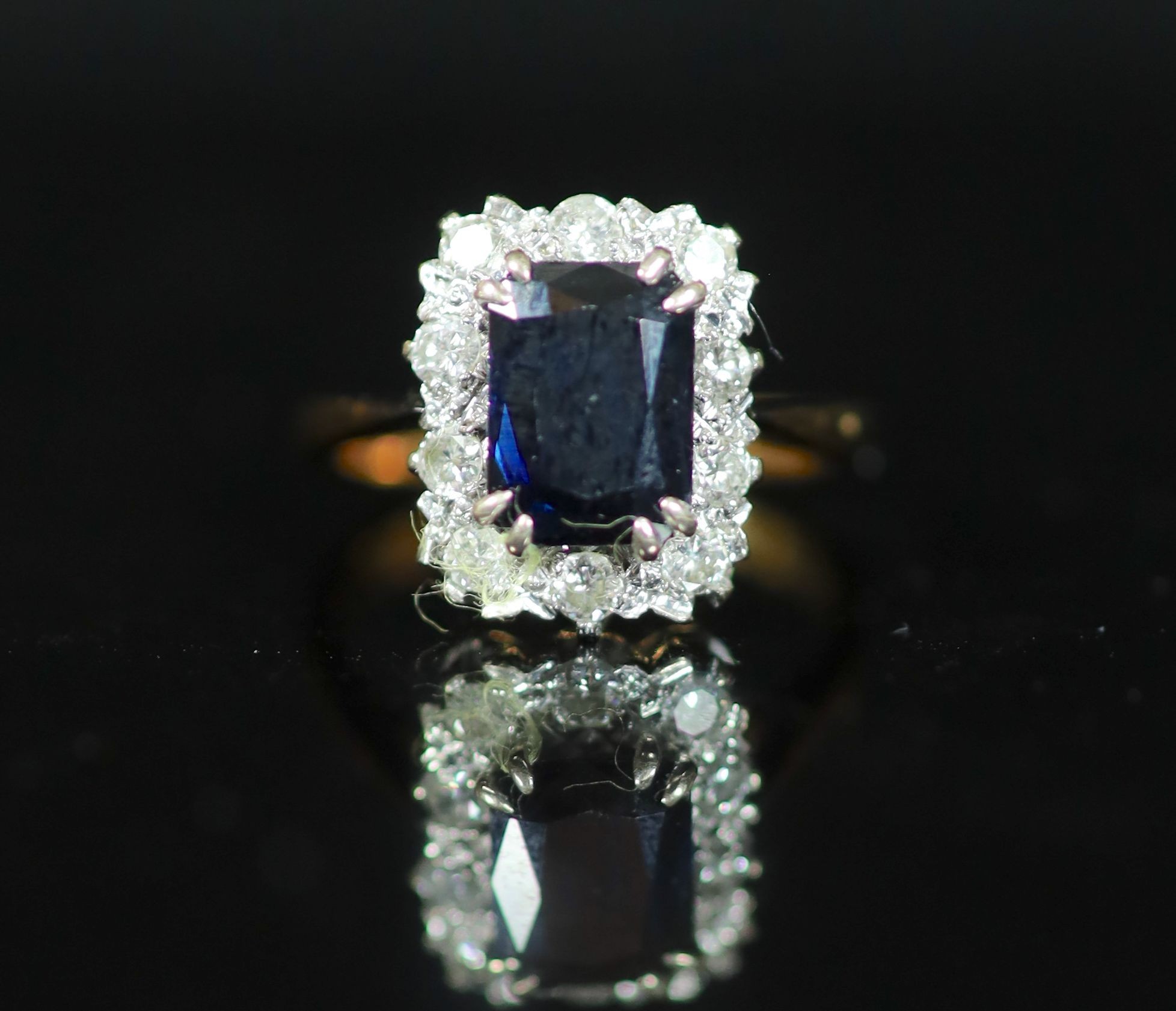 A modern 18ct gold, sapphire and diamond set rectangular cluster ring